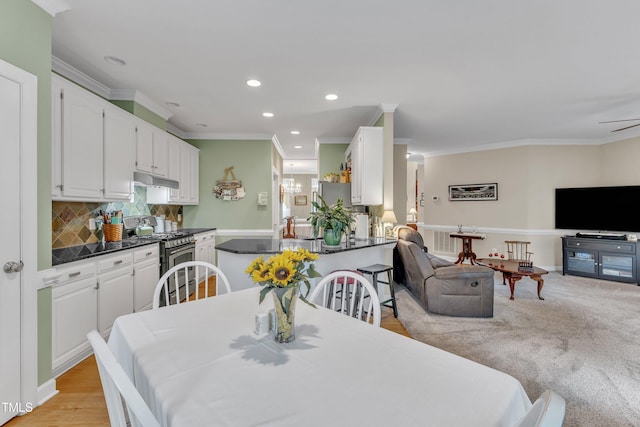 7613 Percy Ct, Raleigh, NC 27613 - dining area with recessed lighting and ornamental molding