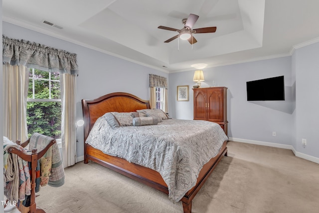 7613 Percy Ct, Raleigh, NC 27613 - bedroom with a raised ceiling, light colored carpet, baseboards, ceiling fan, and crown molding