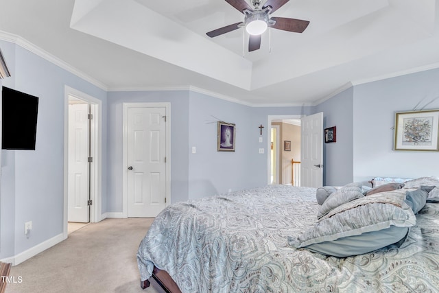 7613 Percy Ct, Raleigh, NC 27613 - bedroom featuring light colored carpet, a raised ceiling, baseboards, crown molding, and a ceiling fan
