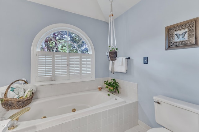 7613 Percy Ct, Raleigh, NC 27613 - full bath featuring a whirlpool tub, vaulted ceiling, and toilet