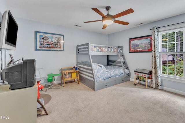 7613 Percy Ct, Raleigh, NC 27613 - bedroom featuring baseboards, carpet floors, and a ceiling fan