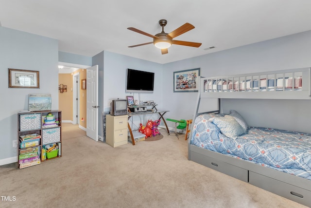 7613 Percy Ct, Raleigh, NC 27613 - carpeted bedroom with baseboards and a ceiling fan