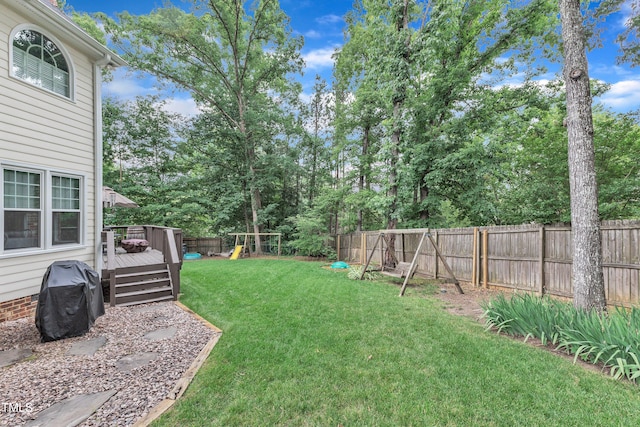 7613 Percy Ct, Raleigh, NC 27613 - view of yard featuring a playground and a wooden deck