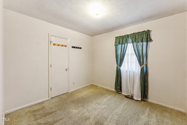 3115 Legion Rd, Hope Mills, NC 28348 - carpeted empty room featuring baseboards