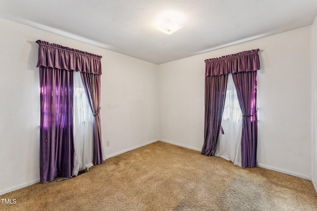 3115 Legion Rd, Hope Mills, NC 28348 - empty room with carpet floors and healthy amount of natural light