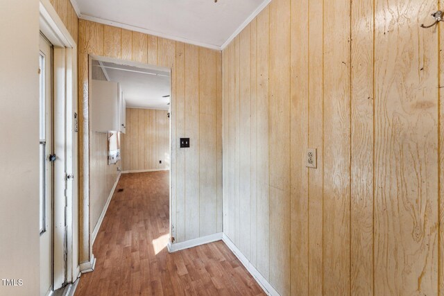 3115 Legion Rd, Hope Mills, NC 28348 - hallway featuring wood finished floors, wood walls, and crown molding