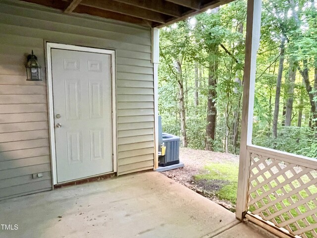 411 Gooseneck Dr Unit A1, Cary, NC 27513 - entrance to property featuring cooling unit and a patio