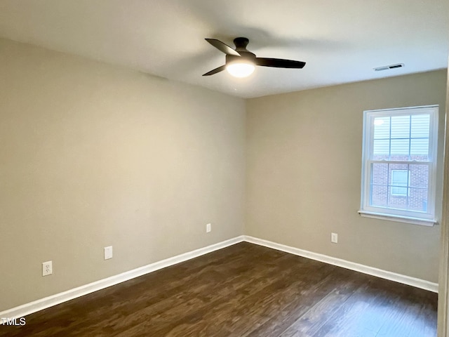 411 Gooseneck Dr Unit A1, Cary, NC 27513 - spare room featuring a ceiling fan, dark wood-style floors, and baseboards