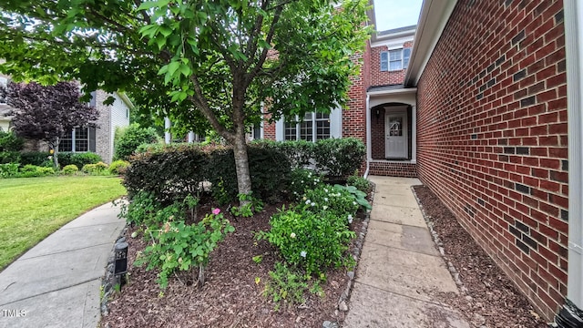 3408 Mount Pisgah Way, Cary, NC 27519 - doorway to property with brick siding and a lawn