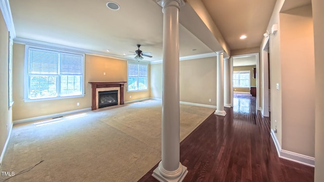 3408 Mount Pisgah Way, Cary, NC 27519 - unfurnished living room featuring decorative columns, baseboards, ceiling fan, ornamental molding, and a fireplace