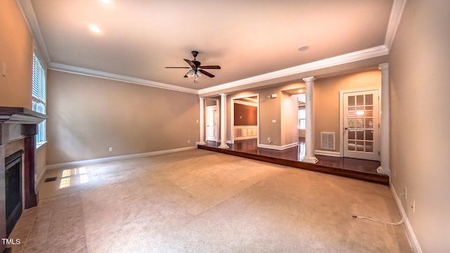 3408 Mount Pisgah Way, Cary, NC 27519 - unfurnished living room with decorative columns, ornamental molding, baseboards, ceiling fan, and a glass covered fireplace