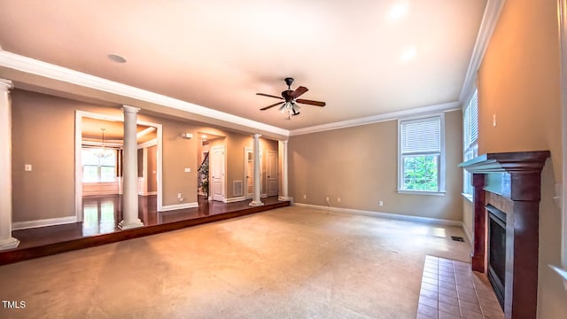 3408 Mount Pisgah Way, Cary, NC 27519 - unfurnished living room featuring ornate columns, ceiling fan, carpet floors, ornamental molding, and plenty of natural light
