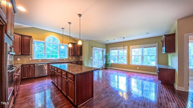 3408 Mount Pisgah Way, Cary, NC 27519 - kitchen featuring stainless steel dishwasher, plenty of natural light, baseboards, dark wood-style flooring, and recessed lighting