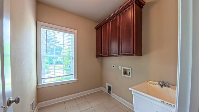 3408 Mount Pisgah Way, Cary, NC 27519 - washroom with hookup for an electric dryer, cabinet space, hookup for a washing machine, baseboards, and light tile patterned floors