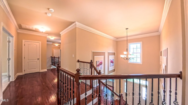 3408 Mount Pisgah Way, Cary, NC 27519 - hallway featuring an upstairs landing, a chandelier, dark wood-type flooring, ornamental molding, and baseboards