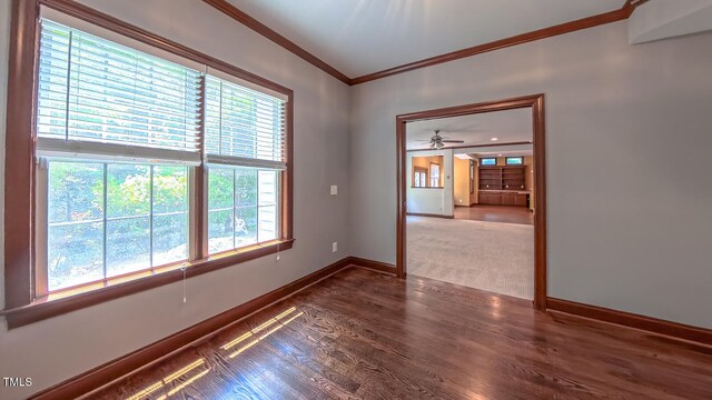 3408 Mount Pisgah Way, Cary, NC 27519 - spare room with crown molding, baseboards, wood finished floors, and ceiling fan