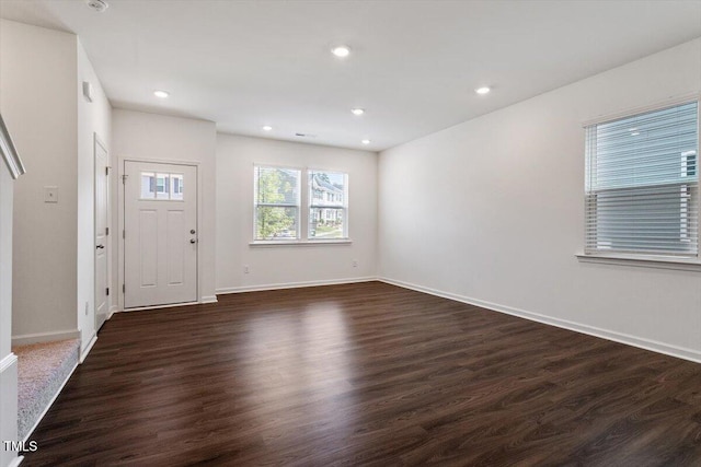3064 Spline Cir, Raleigh, NC 27610 - entrance foyer with dark wood-style floors, baseboards, and recessed lighting
