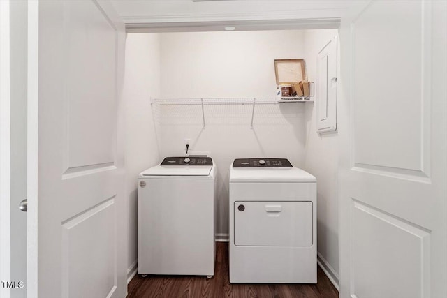 3064 Spline Cir, Raleigh, NC 27610 - laundry room featuring washer and dryer, dark wood-style floors, and electric panel