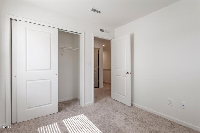 3064 Spline Cir, Raleigh, NC 27610 - unfurnished bedroom with carpet floors, a closet, and baseboards