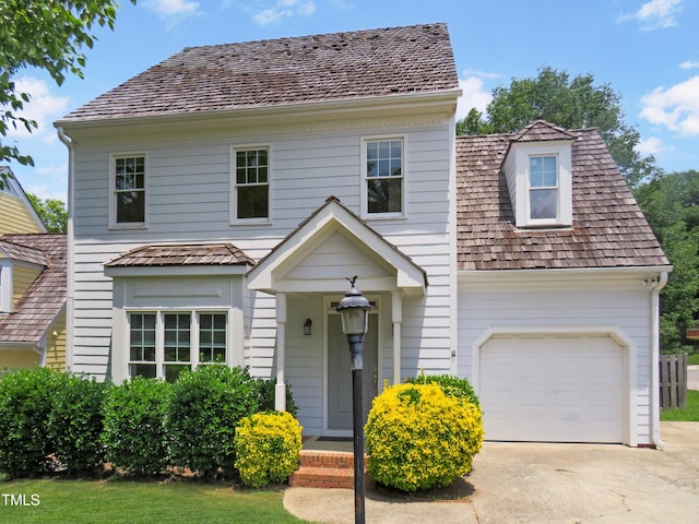 137 Wintermist Dr, Cary, NC 27513 - view of front of house featuring an attached garage and concrete driveway