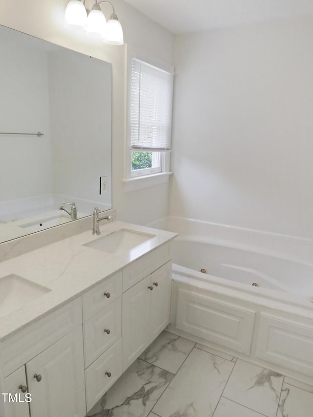 137 Wintermist Dr, Cary, NC 27513 - bathroom featuring a tub with jets, marble look tiles, and double vanity