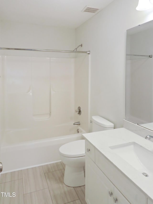 137 Wintermist Dr, Cary, NC 27513 - bathroom with vanity, toilet, and shower / washtub combination