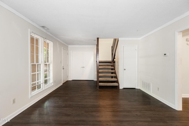 1809-1811 Quail Ridge Rd, Raleigh, NC 27609 - unfurnished living room with stairway, dark wood-style flooring, crown molding, and baseboards