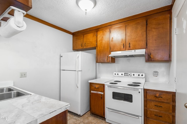 1809-1811 Quail Ridge Rd, Raleigh, NC 27609 - kitchen featuring white appliances, under cabinet range hood, brown cabinets, a textured ceiling, and light countertops
