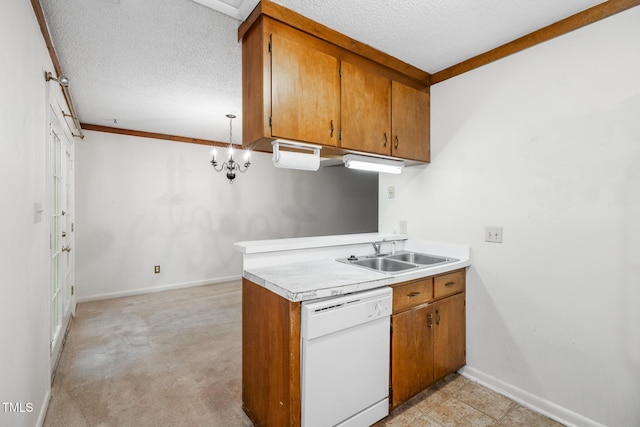 1809-1811 Quail Ridge Rd, Raleigh, NC 27609 - kitchen with white dishwasher, a sink, brown cabinets, a textured ceiling, and light countertops