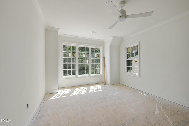 1229 Dixie Trl, Raleigh, NC 27607 - spare room with plenty of natural light, crown molding, and ceiling fan