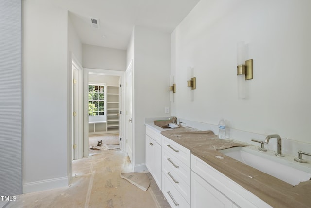 1229 Dixie Trl, Raleigh, NC 27607 - bathroom featuring a closet and double vanity