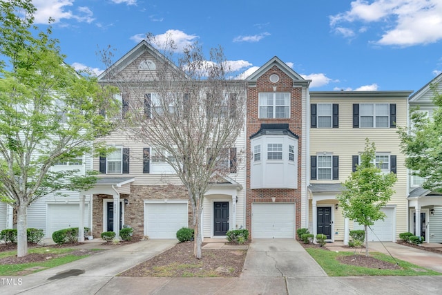 3027 Courtney Creek Blvd, Durham, NC 27713 - townhome / multi-family property featuring driveway and an attached garage