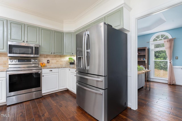 3901 Phlox Rd, Raleigh, NC 27616 - kitchen featuring stainless steel appliances, dark wood-style flooring, light stone counters, tasteful backsplash, and crown molding