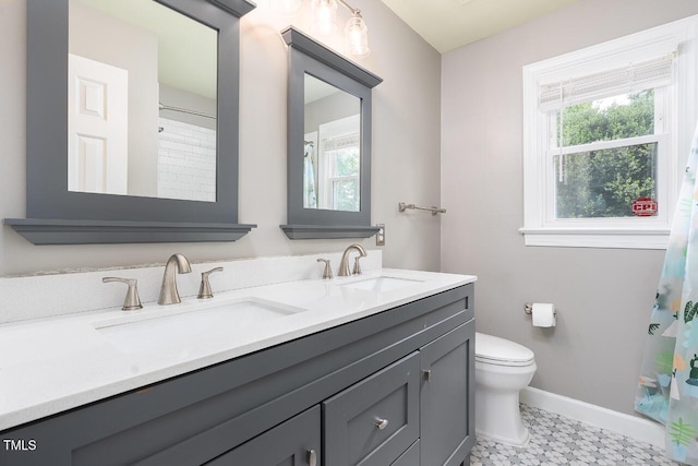3901 Phlox Rd, Raleigh, NC 27616 - bathroom featuring double vanity, tile patterned floors, and curtained shower