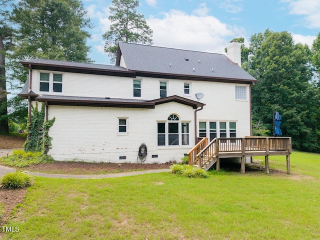 3901 Phlox Rd, Raleigh, NC 27616 - rear view of property with crawl space, a wooden deck, a yard, and brick siding