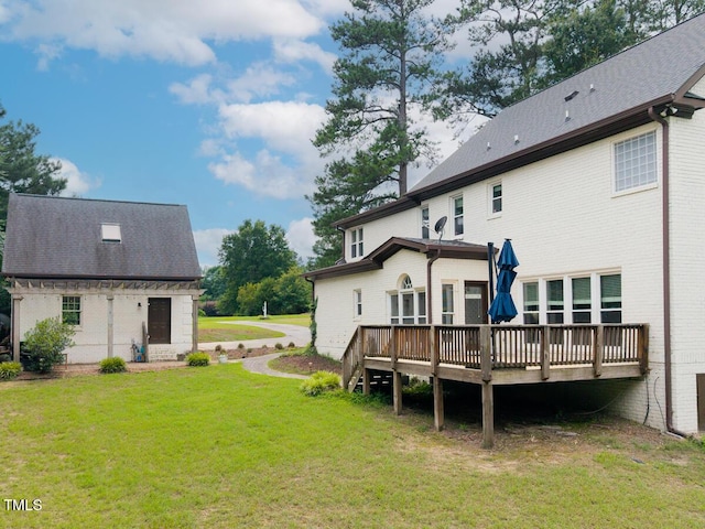3901 Phlox Rd, Raleigh, NC 27616 - back of property featuring a wooden deck and a lawn