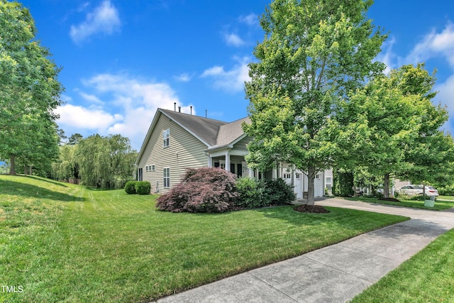 1808 Pennypacker Ln, Durham, NC 27703 - view of side of home featuring a yard and driveway