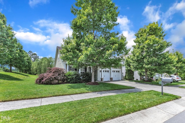1808 Pennypacker Ln, Durham, NC 27703 - obstructed view of property with concrete driveway, a front yard, and a garage