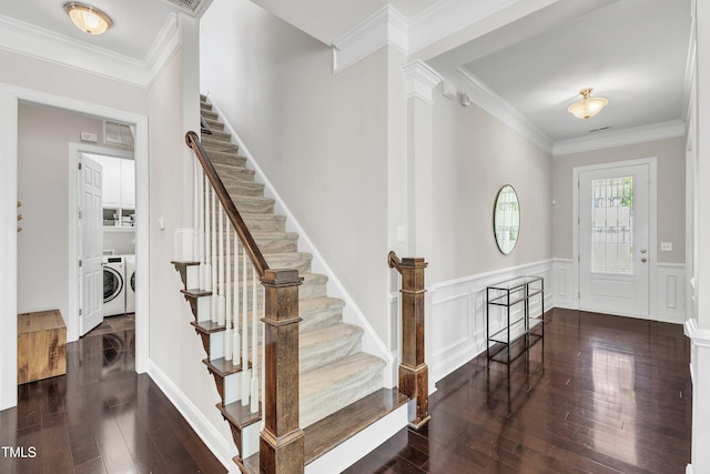 1808 Pennypacker Ln, Durham, NC 27703 - entrance foyer featuring independent washer and dryer, hardwood / wood-style floors, stairs, a wainscoted wall, and ornamental molding