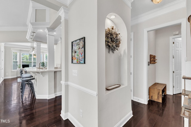 1808 Pennypacker Ln, Durham, NC 27703 - hallway with crown molding, dark wood-type flooring, and baseboards