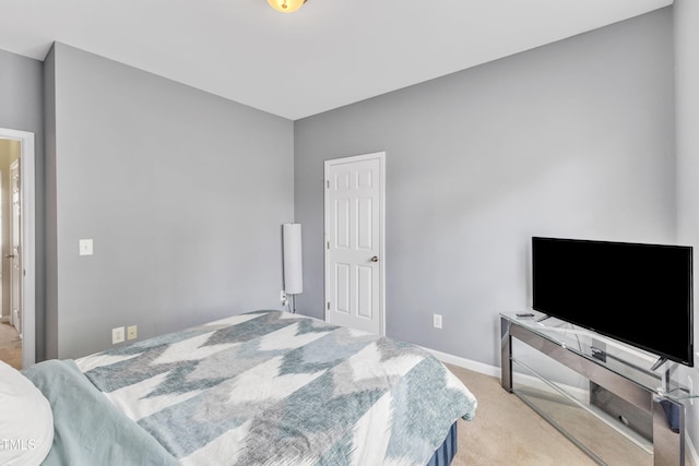 1808 Pennypacker Ln, Durham, NC 27703 - bedroom featuring light colored carpet and baseboards
