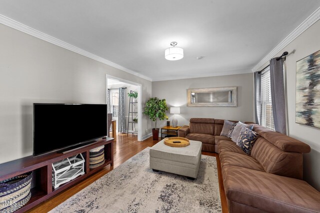 5412 Farley Dr, Raleigh, NC 27609 - living area with ornamental molding and wood finished floors