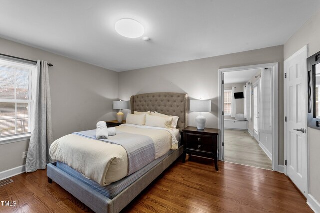 5412 Farley Dr, Raleigh, NC 27609 - bedroom featuring wood finished floors and baseboards
