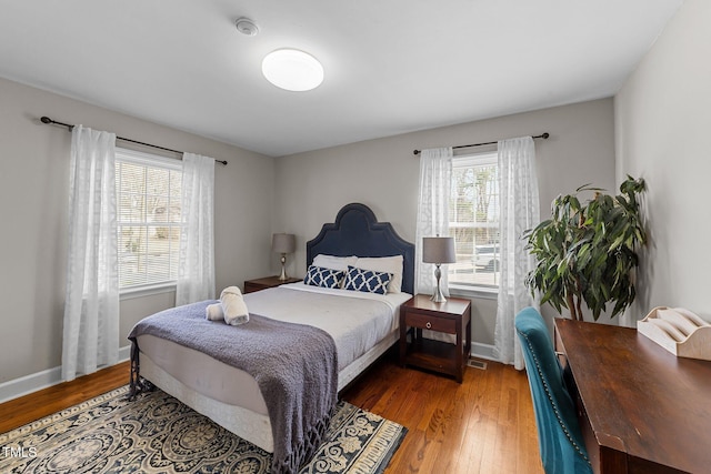 5412 Farley Dr, Raleigh, NC 27609 - bedroom featuring wood finished floors and baseboards