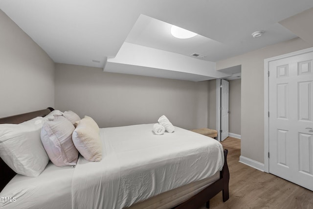 5412 Farley Dr, Raleigh, NC 27609 - bedroom featuring wood finished floors and baseboards