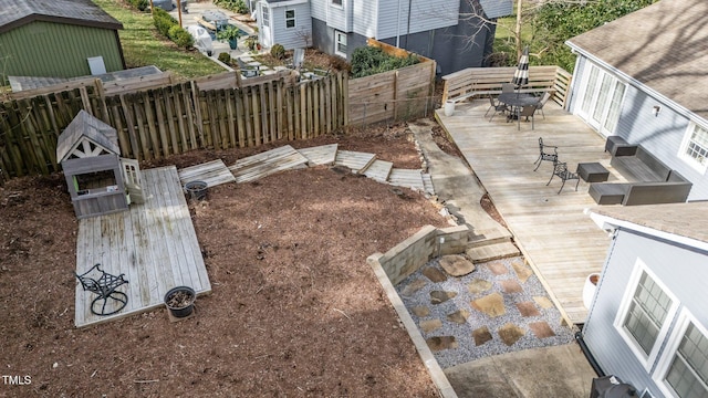 5412 Farley Dr, Raleigh, NC 27609 - view of yard with a deck and outdoor dining space