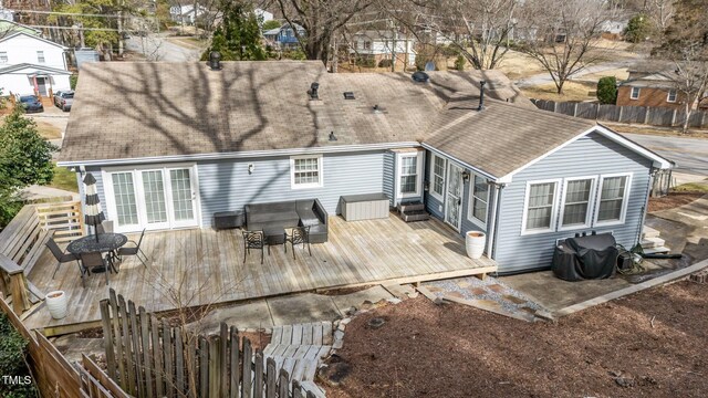 5412 Farley Dr, Raleigh, NC 27609 - rear view of house with a deck, roof with shingles, and outdoor dining space