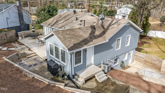 5412 Farley Dr, Raleigh, NC 27609 - back of house featuring a shingled roof, a deck, and outdoor dining space