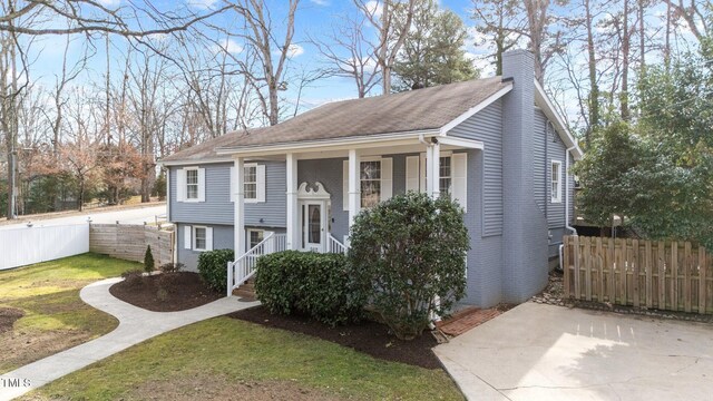 5412 Farley Dr, Raleigh, NC 27609 - split foyer home with a chimney