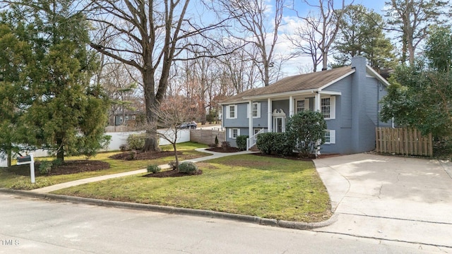 5412 Farley Dr, Raleigh, NC 27609 - raised ranch with a chimney and concrete driveway